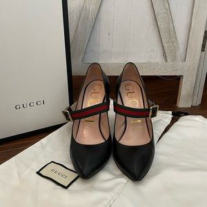 Gucci Sylvie Black Pumps with Web buckle. Comes with shoe bags and box.